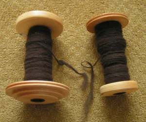 2 bobbins of yarn